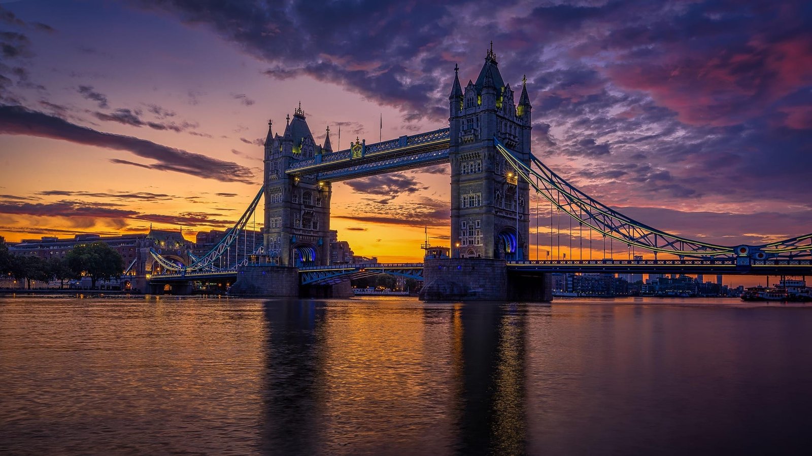 Iconic Tower Bridge in London at sunset, a symbol of British heritage and city exploration.